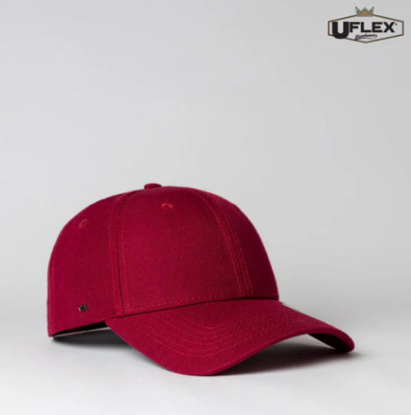 Red baseball cap on a light gray background with 'UFlex' branding.